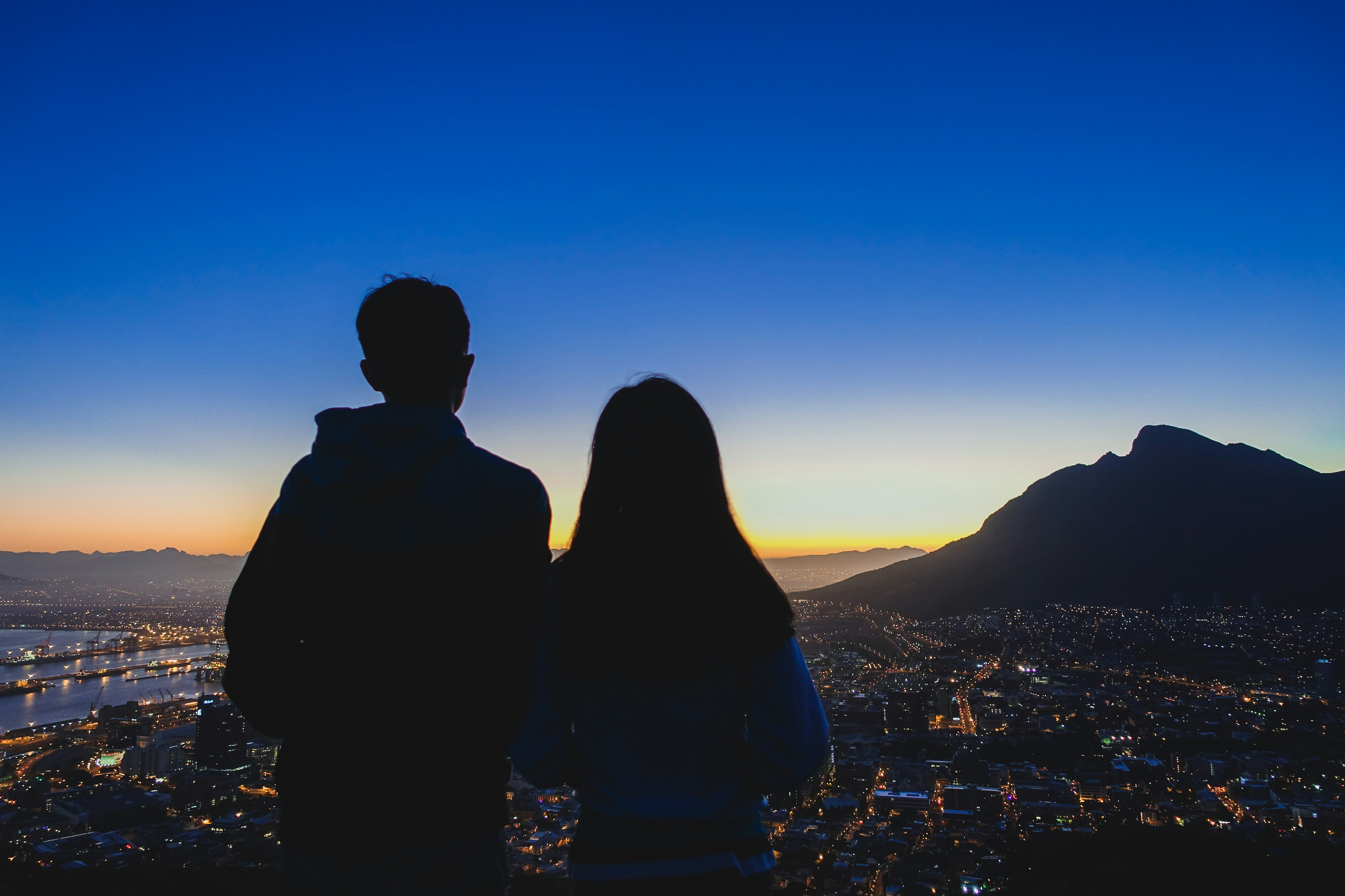 Couple watching sunrise over Cape Town