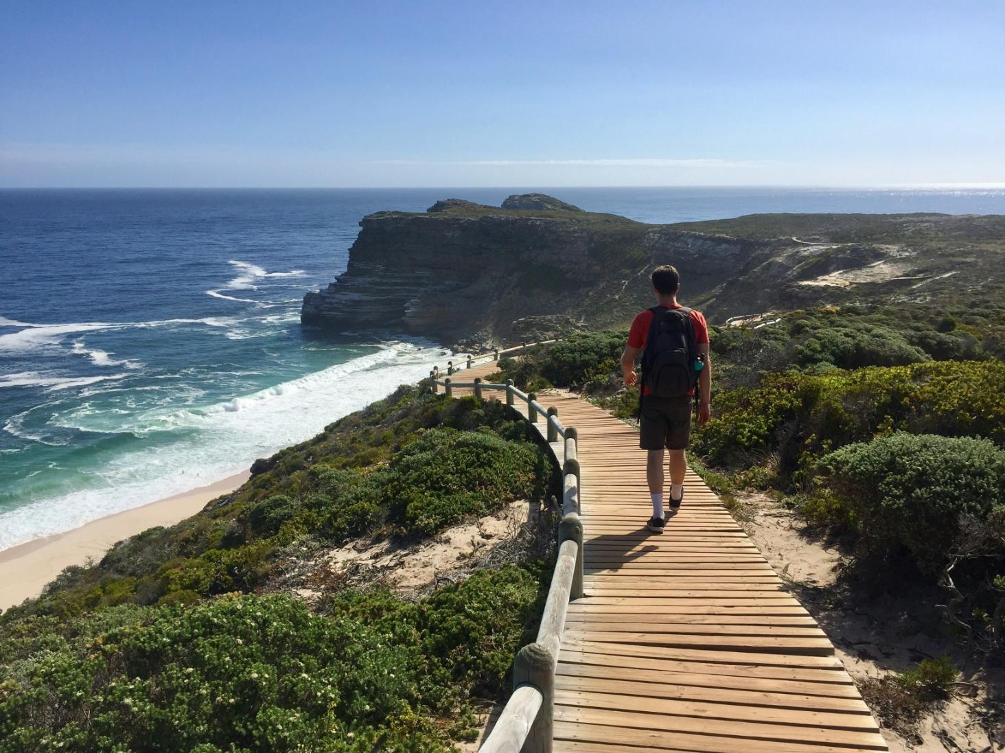 Tourist walking along the boardwalk at Cape Point