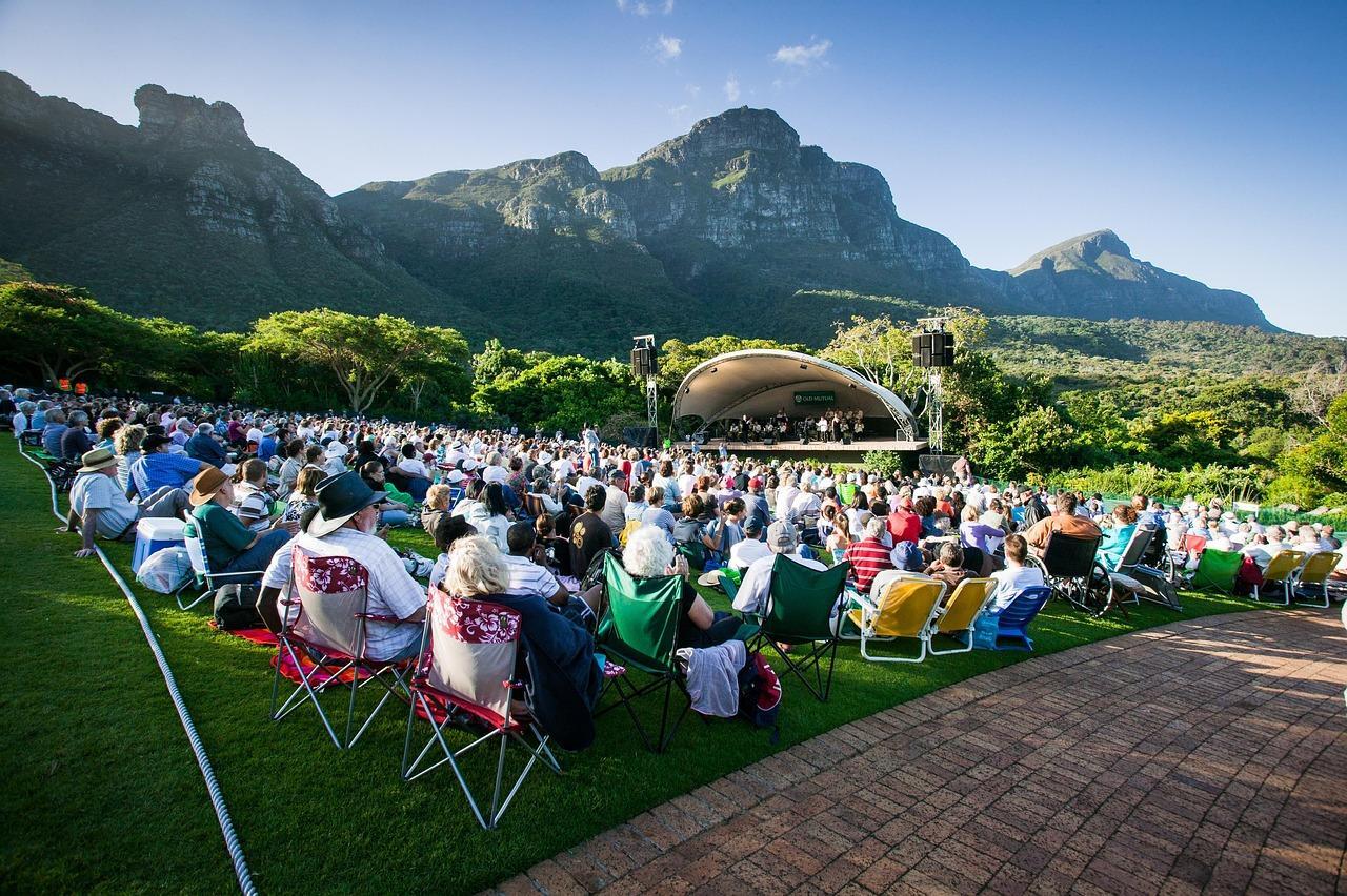 Crowd sitting in front of amphitheatre at Kirstenbosch Summer Concerts