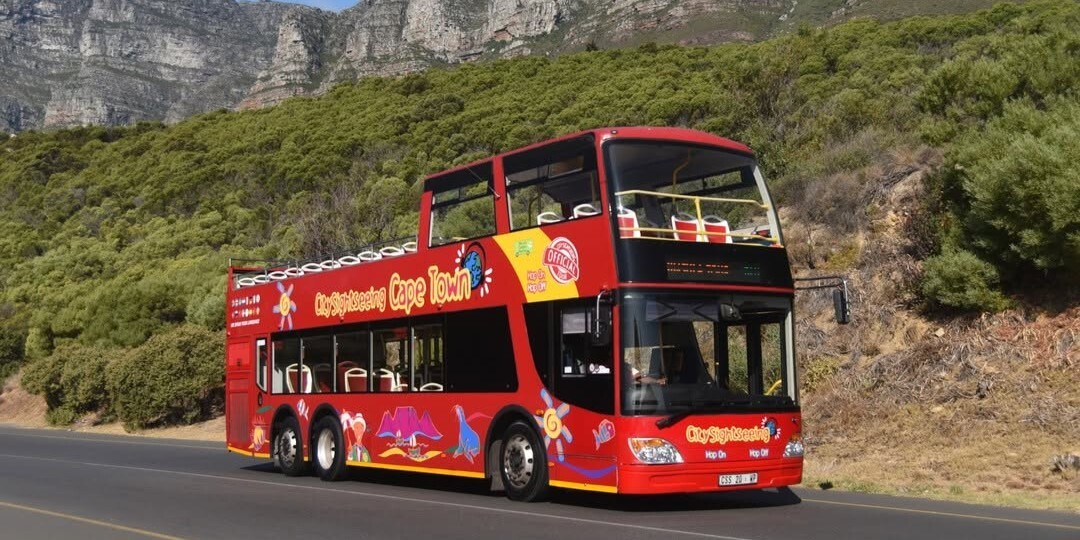 City sightseeing Red Tour Bus on Victoria Road, Cape Town