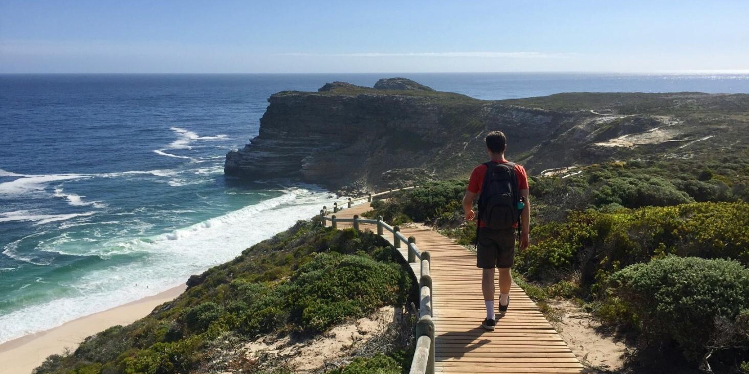 Tourist walking along the boardwalk at Cape Point