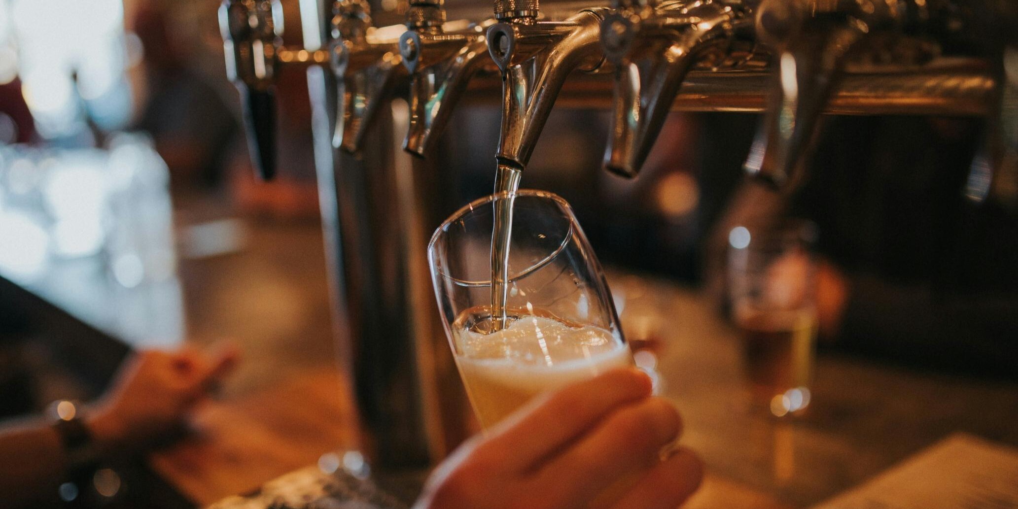 Beer being poured from tap